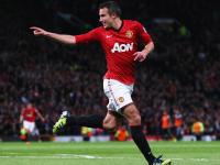 爱游戏官方入口-胜利的共振，绿茵场与方寸球台的双重奏